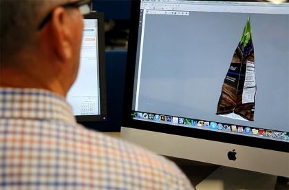 Prepress preparation for flexible packaging artwork, including color separation, trapping, and print-ready file setup.